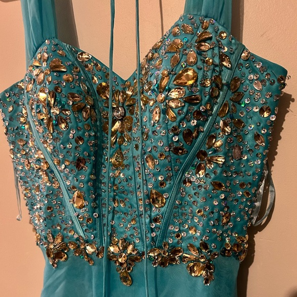 Formal blue dress with sheer cap sleeves by Sally USA in a size medium - Picture 2 of 4